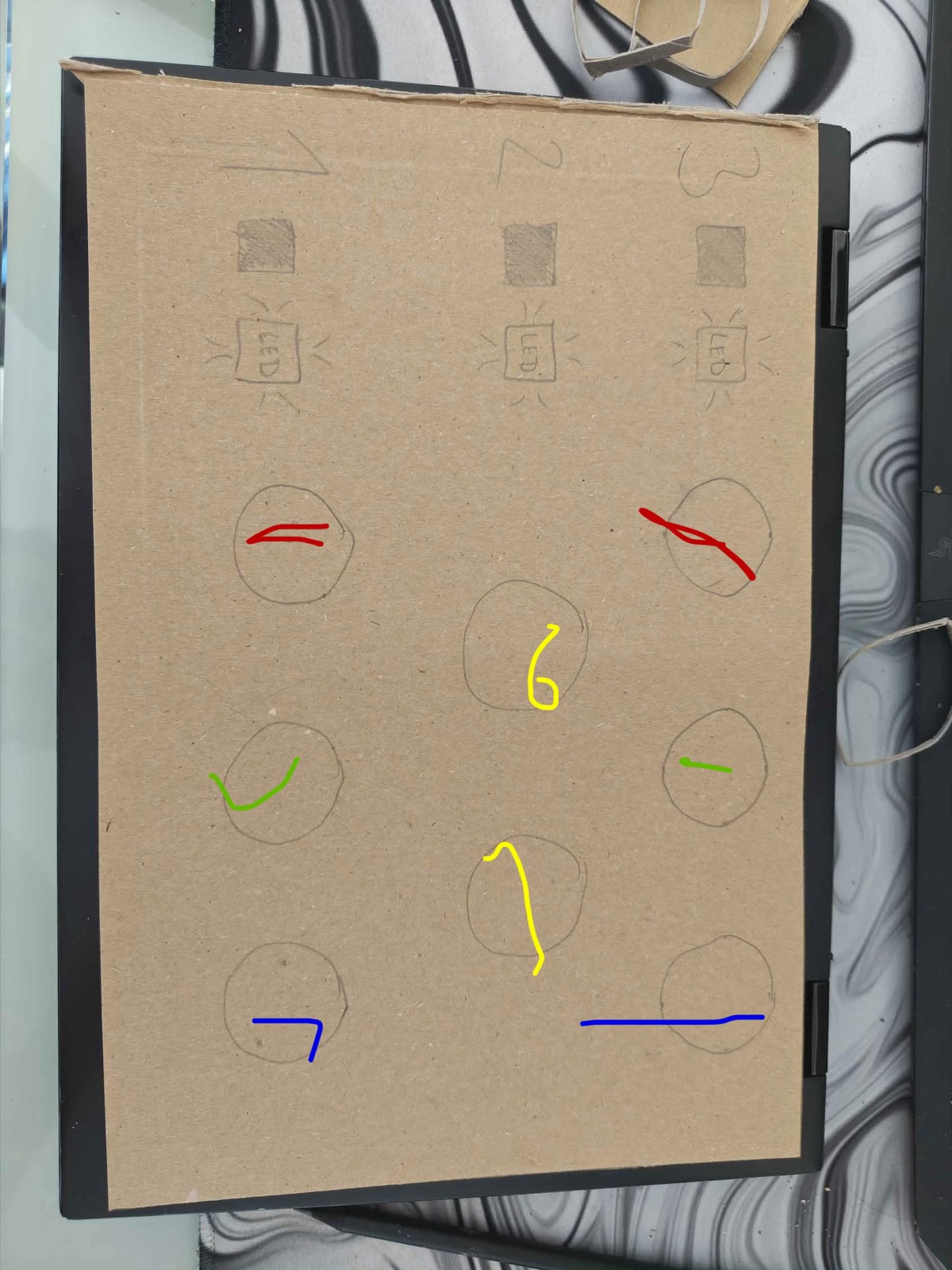 Figure 4&colon; Cardboard mock-up used to check the real button spacing and colour arrangement.