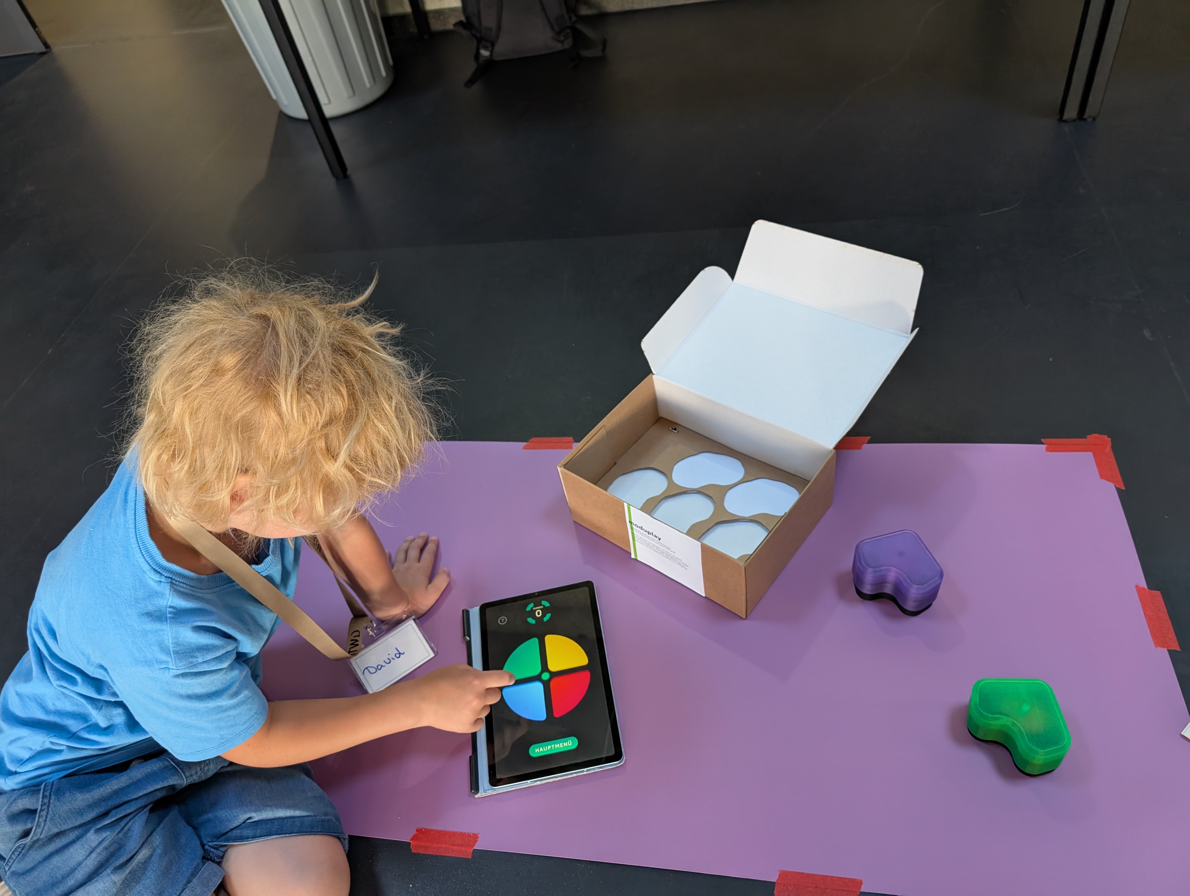 Kid playing with MODUPLAY
